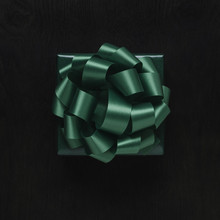 Top View Of Wrapped Christmas Present With Bow