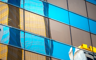 Modern office building detail, glass surface with B&W color