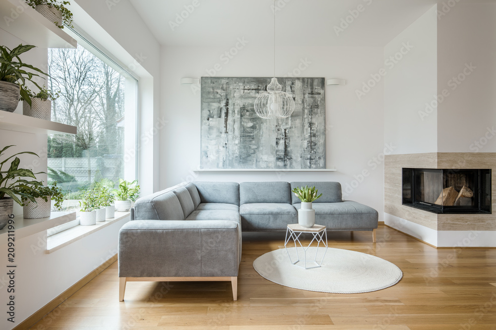 Spacious White Living Room Interior With Grey Corner Couch