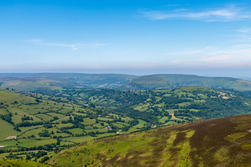 Wall Mural - aerial view of green farmland and fields in the rural welsh countryside