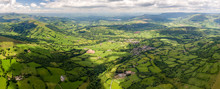 Panoramic Aerial View Of Green Farmland And Fields In The Rural Welsh Countryside