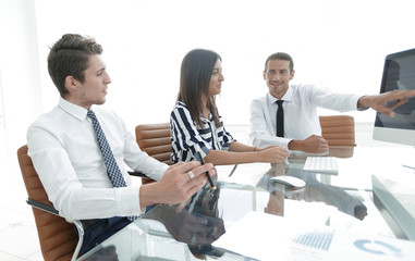 Wall Mural - employees discussing sales statistics.