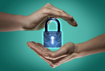 Image of two hands on blue and green background. Closed lock icon in the center, as a symbol of confidentiality, data protection and security.