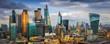 London, England - Panoramic skyline view of Bank and Canary Wharf, central London's leading financial districts with famous skyscrapers and other landmarks at golden hour sunset 