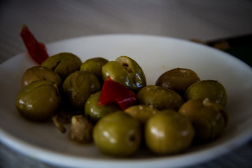 Malaga, Spain; April 29, 2018: Plate of seasoned olives