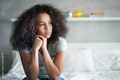 Cuadros en Lienzo Depressed Hispanic Girl With Sad Emotions And Feelings