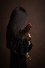 Girl With Hen