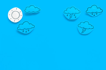 Wall Mural - modern weather icons set on blue background top view copy space