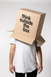 Man with box on his head, think outside the box