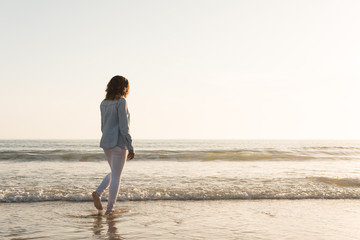 Wall Mural - Woman at the beach