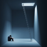 Fototapeta Dmuchawce - Ein Mann sitzt depressiv in einem Raum mit Leiter