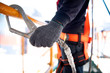 © Getty Gallery - Construction worker use safety harness and safety line working on a new construction site project.