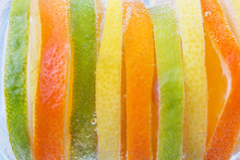 Different Sliced Citrus Like One Whole Fruit. Fruit Background.