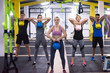 © .shock - athletes doing exercises with kettlebells