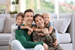 © New Africa - Woman in military uniform with her family at home