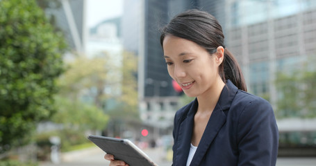 Wall Mural - Businesswoman use of tablet computer