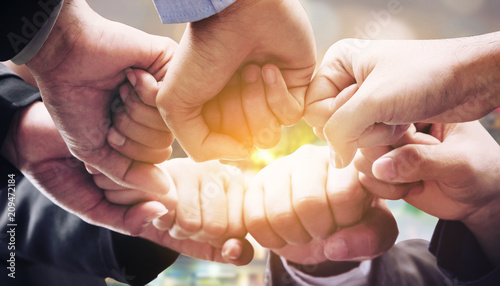 Business people team joining hands. Poster Mural XXL