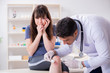 © Elnur - Patient visiting doctor after sustaining sports injury