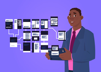 Poster - african businessman with laptop over site map suitable for info graphics, websites and print media a