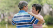 © leungchopan - Senior old couple dancing at outdoor