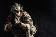 © fotofabrika - Special forces soldier with rifle on dark background