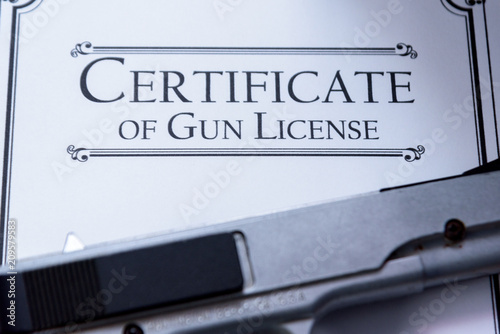 Fotografía Hangun laying on a Gun / Firearms License Certificate