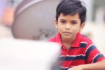 Wall Mural -      Portrait of Indian Little boy Posing to Camera with Expression 