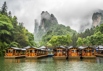 Baofeng Lake Boat Trip in a rainy day with clouds and mist at Wulingyuan, Zhangjiajie National Forest Park, Hunan Province, China, Asia