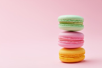 Wall Mural - Macarons. Colorful Macaroons On Pink Background