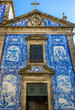 Traditional historic facade in Porto decorated with blue hand painted tin-glazed tiles, Oporto, Portugal