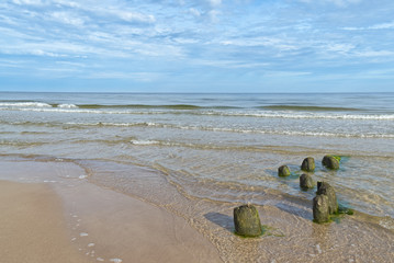 Wall Mural - Baltic Sea - blue sky, wave sea and waterbreak.