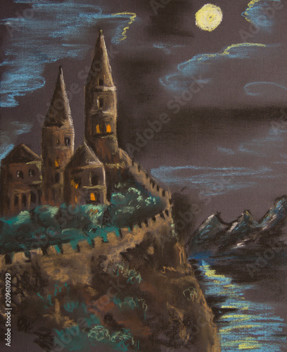 Ancient Castle On A High Rock Illuminated By The Moon