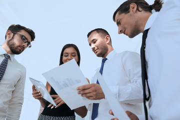 closeup of business team looking at the working papers