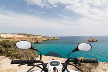ATV Quad Bike Parked On The Shore Of Aegean Sea On Milos Island, Greece