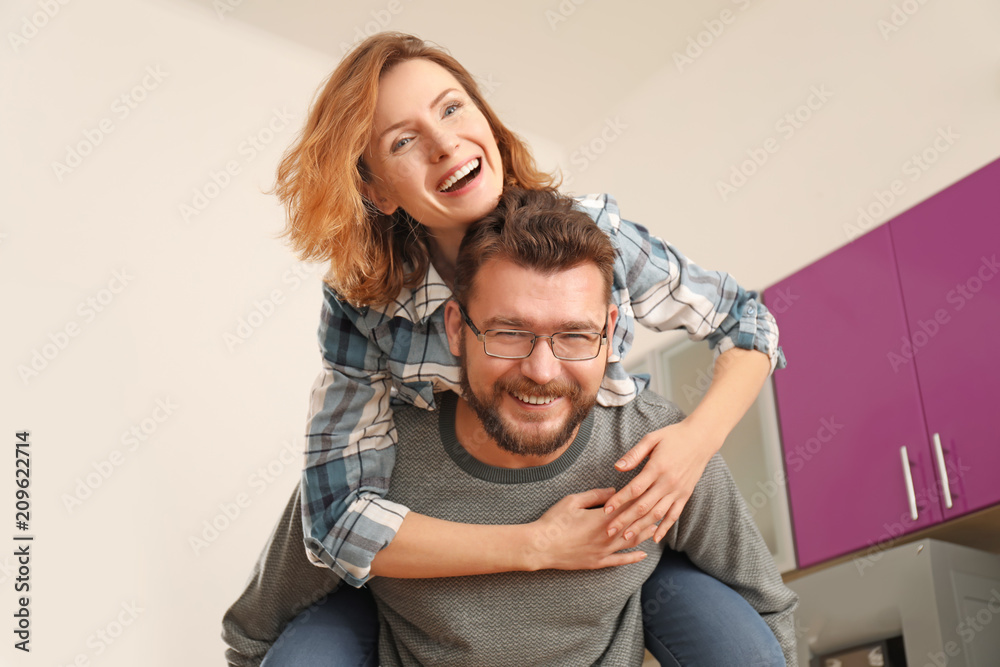 Lovely couple having fun together at home