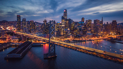 Wall Mural - Aerial Cityscape view of San Francisco and the Bay Bridge at Night