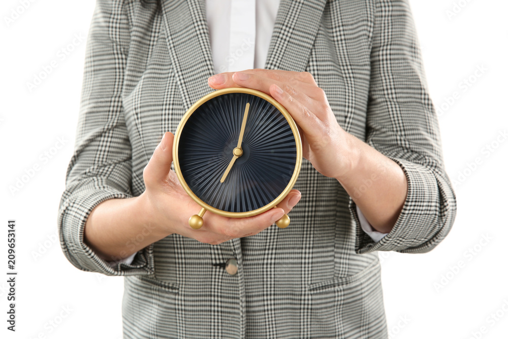 Woman holding clock on white background. Time management concept