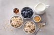 © Pixel-Shot - Composition with tasty oatmeal, fresh berries, milk and honey on table