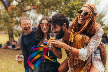 Friends enjoying at summer music festival