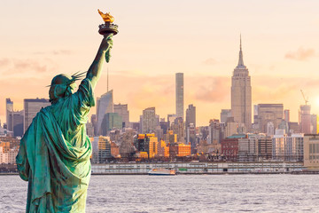 Wall Mural - Statue Liberty and  New York city skyline at sunset