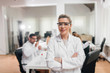 © bnenin - Portrait of smiling female scientist wearing safety glasses.