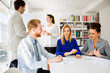 © NDABCREATIVITY - Business people working in office