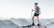 © XtravaganT - Fit young woman hiking in high altitude mountains