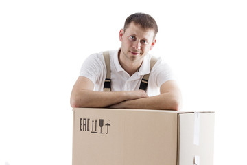 Portrait of relocation mover man on cardboard box isolated on white background