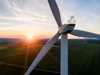 Wall Mural - Sunset above the windmill on the field