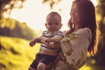 portrait of beautiful young mother and her baby boy.