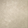 © bubligg - Textured background. Decorative plaster walls, external decoration of facade. Texture of beige