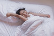 © nareekarn - health and beauty concept - little girl sleeping at home
