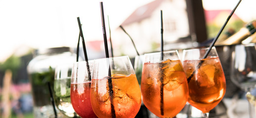 .process of preparation of a cocktail Aperol  spritz close-up.