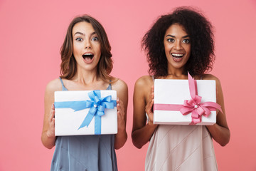 Sticker - Pretty shocked young two women holding gifts